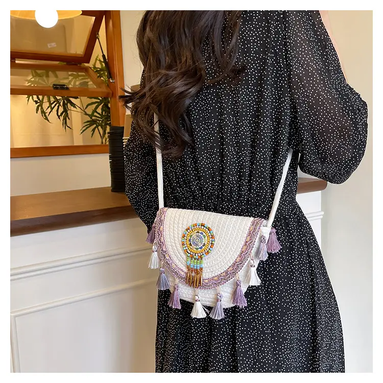 Straw Tassel Crossbody Bag with Embroidered Ball — feature 28