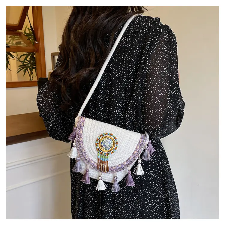 Straw Tassel Crossbody Bag with Embroidered Ball — feature 29
