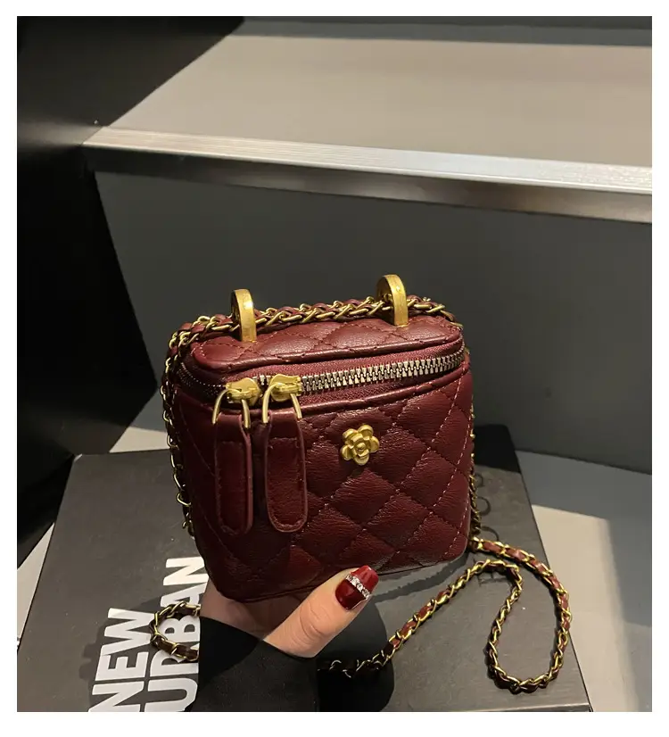 Women's Maroon Quilted Bucket Bag with Gold Chain — feature 1
