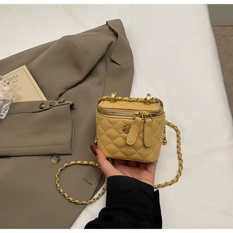 Women's Maroon Quilted Bucket Bag with Gold Chain — feature 34