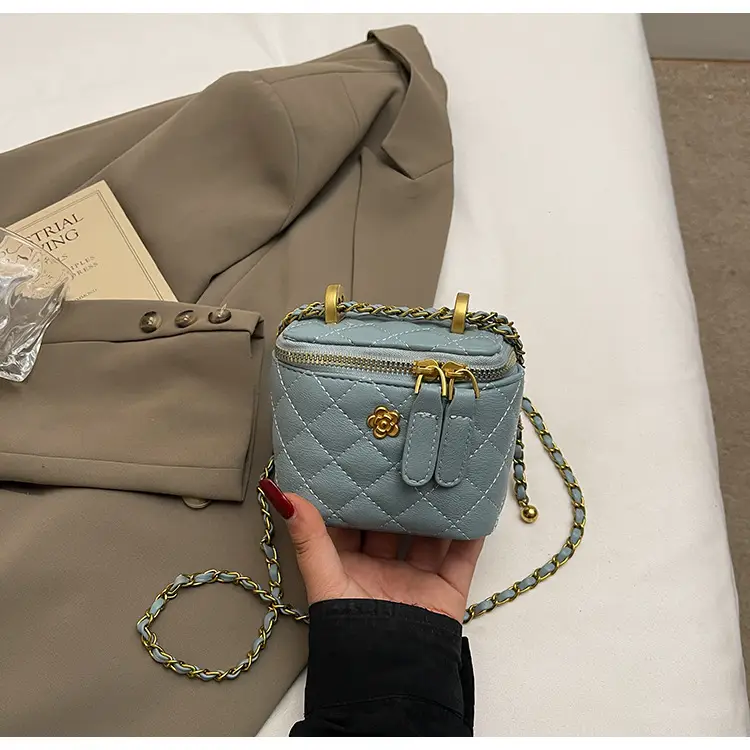Women's Maroon Quilted Bucket Bag with Gold Chain — feature 39