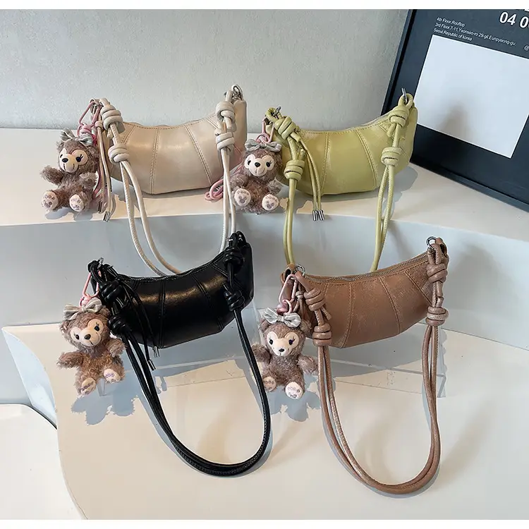 Women's Yellow Leather Shoulder Bag with Doll Keychain — feature 13