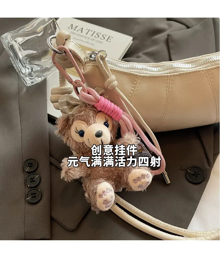 Women's Yellow Leather Shoulder Bag with Doll Keychain — feature 4