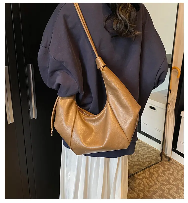 Brown Leather Pouch Bag with Drawstring Closure — feature 2