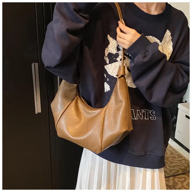 Brown Leather Pouch Bag with Drawstring Closure — feature 21