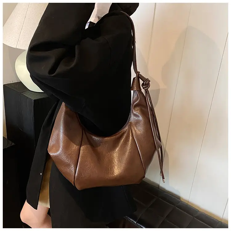 Brown Leather Pouch Bag with Drawstring Closure — feature 27
