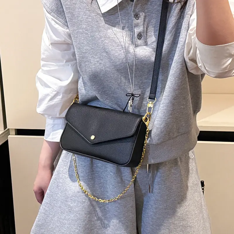 Women's Black Leather Crossbody Bag with Gold Chain