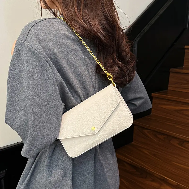 Women's Black Leather Crossbody Bag with Gold Chain