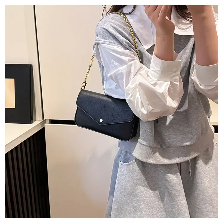 Women's Black Leather Crossbody Bag with Gold Chain — feature 11