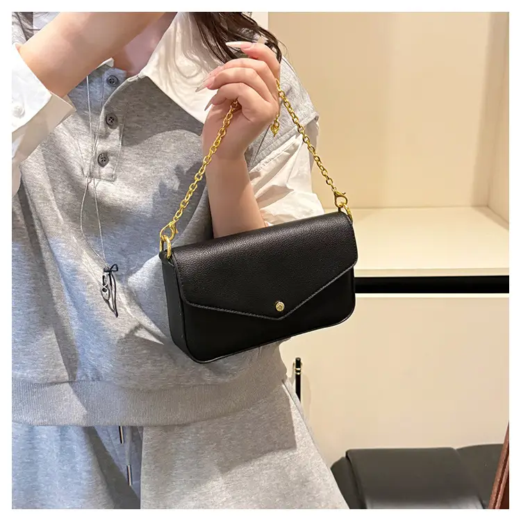Women's Black Leather Crossbody Bag with Gold Chain — feature 12