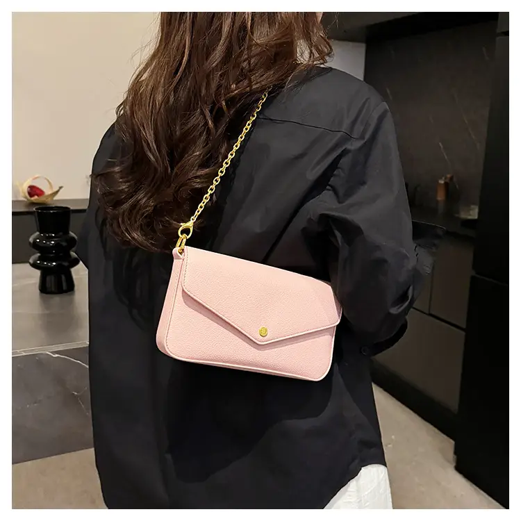 Women's Black Leather Crossbody Bag with Gold Chain — feature 18
