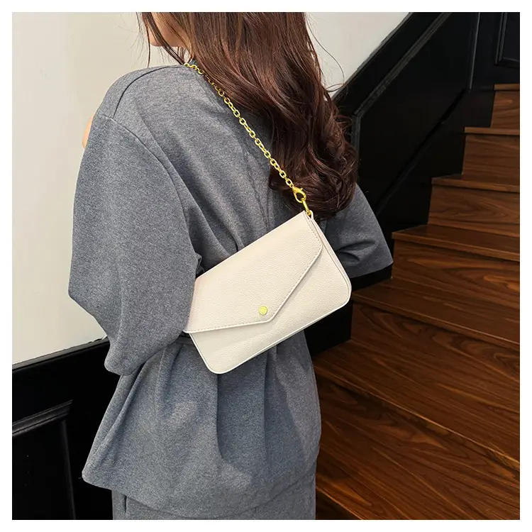Women's Black Leather Crossbody Bag with Gold Chain — feature 19
