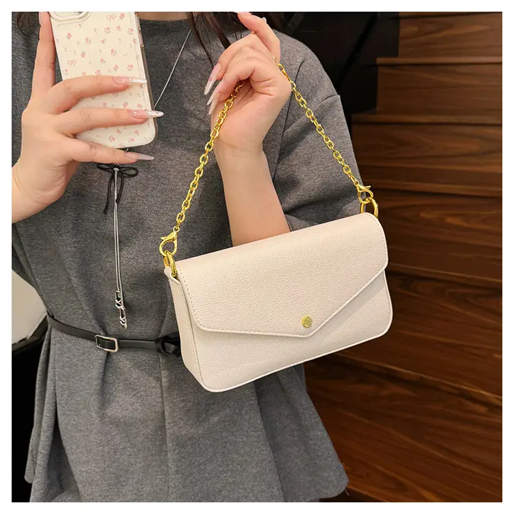 Women's Black Leather Crossbody Bag with Gold Chain — feature 21