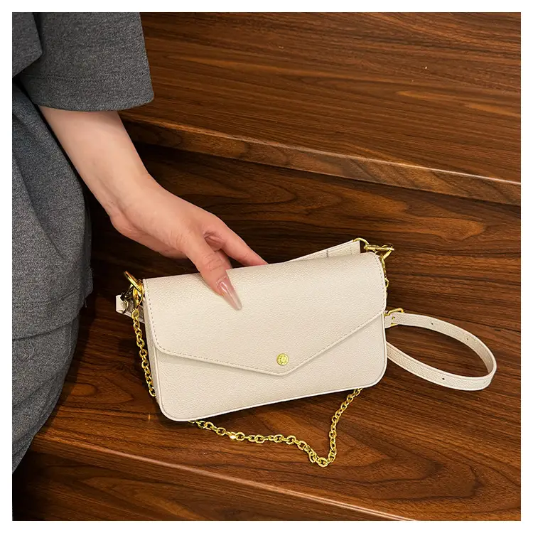 Women's Black Leather Crossbody Bag with Gold Chain — feature 22
