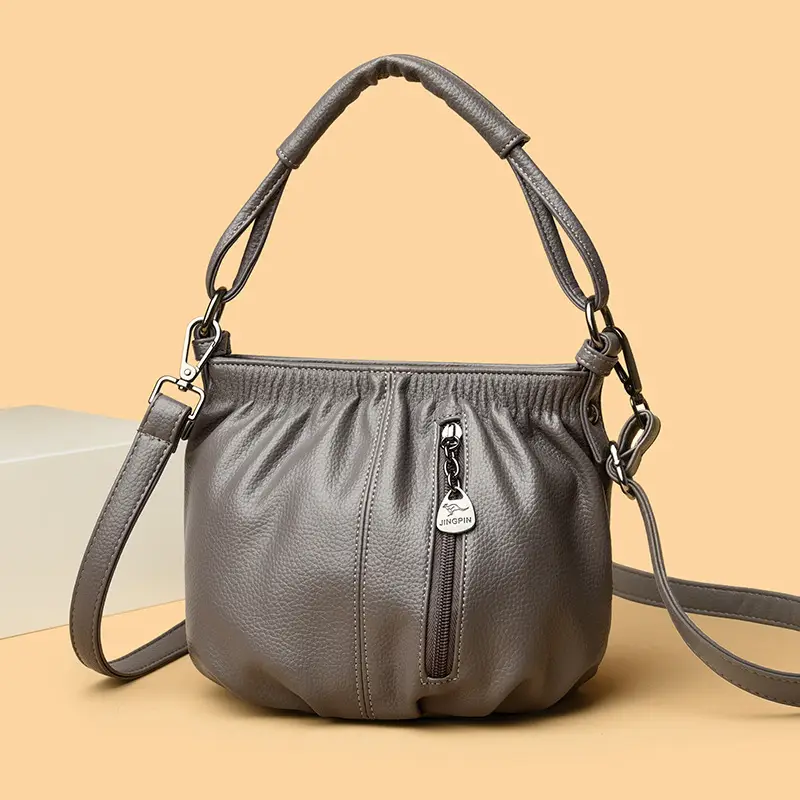 Women's Brown Leather Bucket Bag with Logo Print - Image 7