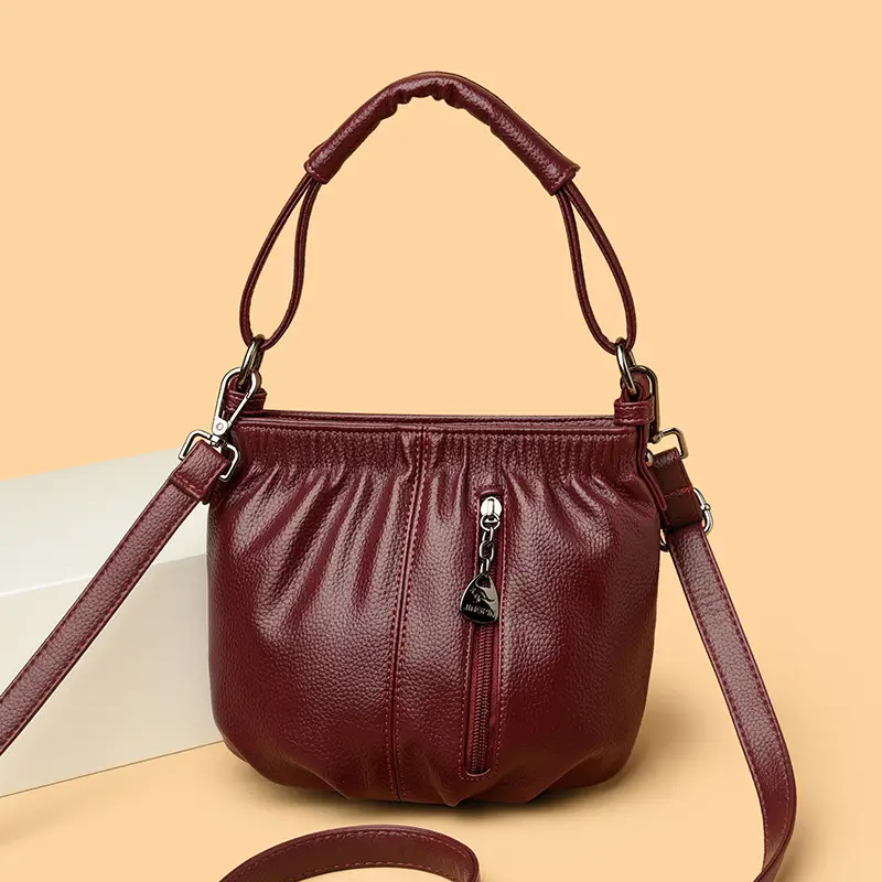 Women's Brown Leather Bucket Bag with Logo Print - Image 8