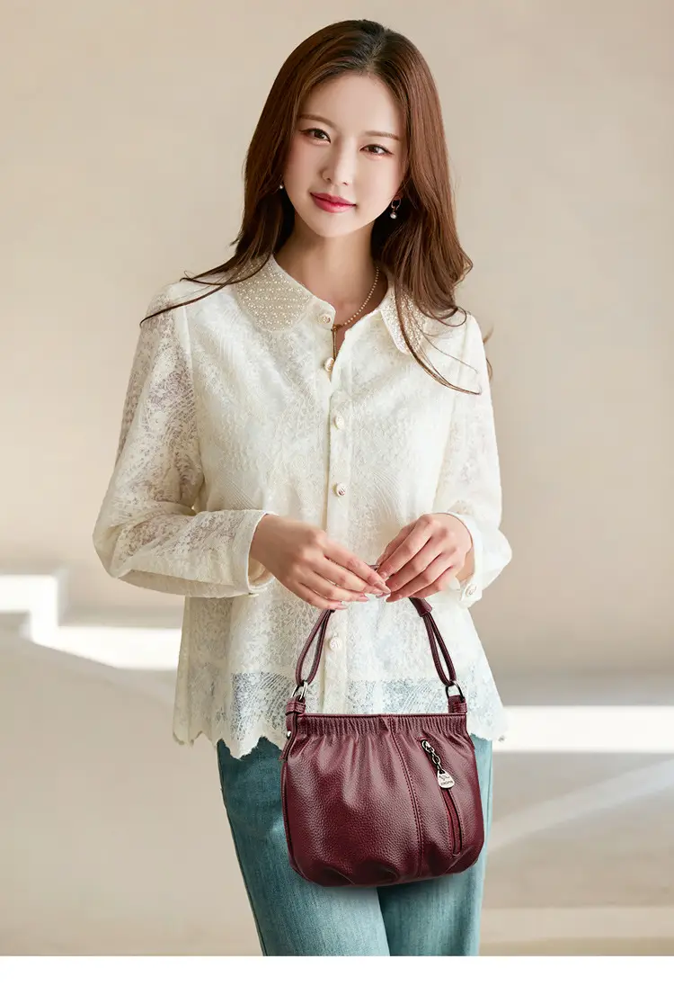 Women's Brown Leather Bucket Bag with Logo Print — feature 12