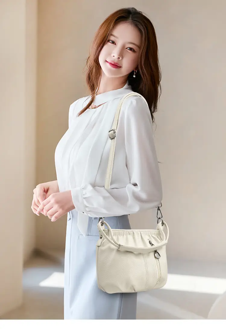 Women's Brown Leather Bucket Bag with Logo Print — feature 13