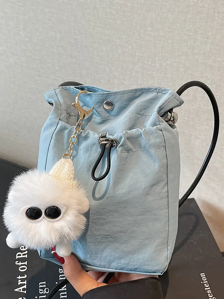 Lightweight Women's Drawstring Bag with Pom Pom Charm - Image 8