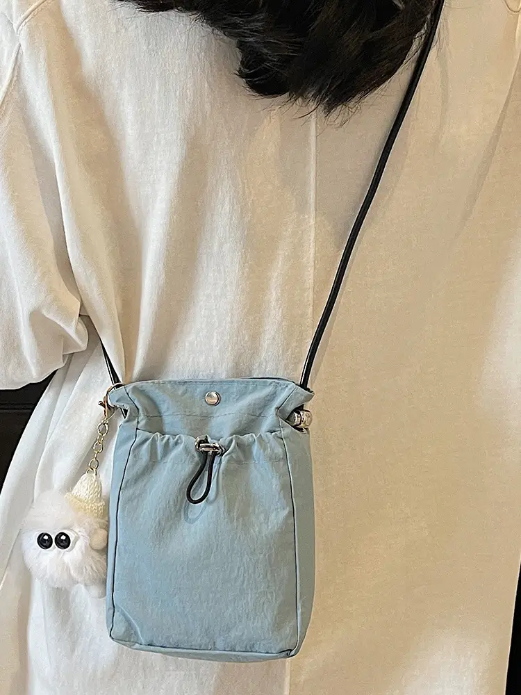 Lightweight Women's Drawstring Bag with Pom Pom Charm - Image 9