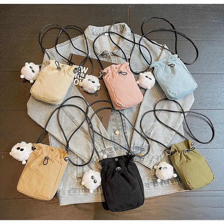 Lightweight Women's Drawstring Bag with Pom Pom Charm — feature 17