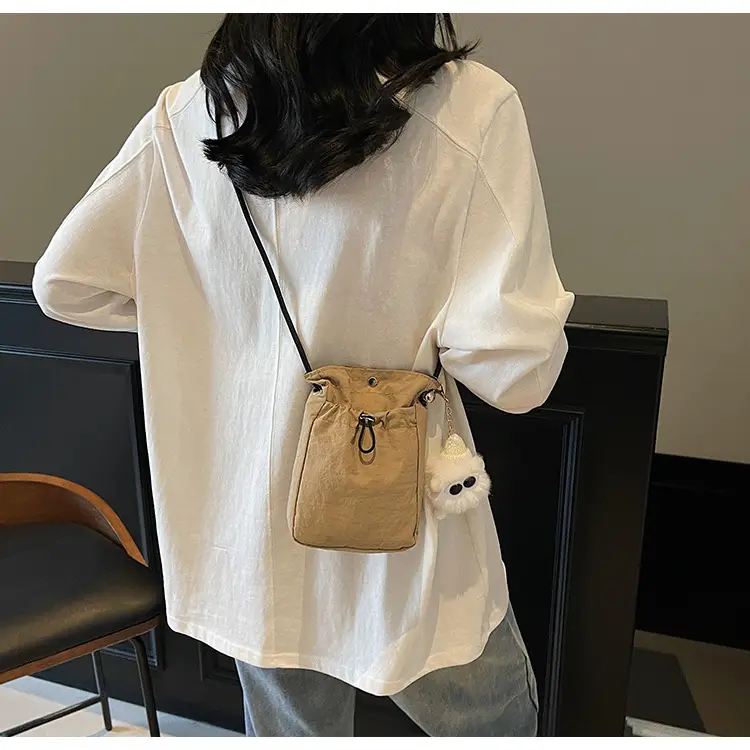 Lightweight Women's Drawstring Bag with Pom Pom Charm — feature 19