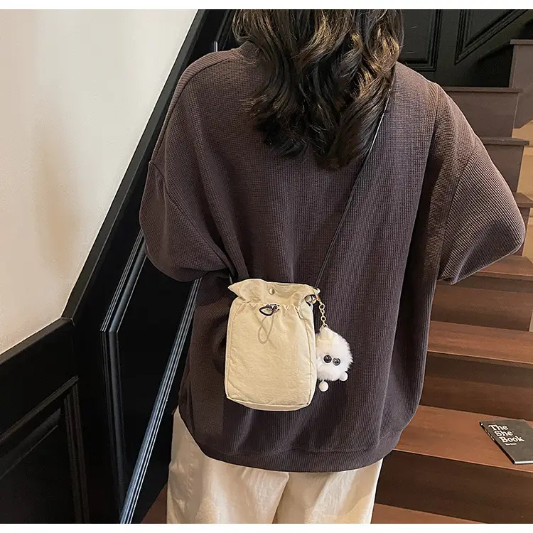 Lightweight Women's Drawstring Bag with Pom Pom Charm — feature 22