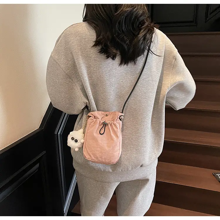 Lightweight Women's Drawstring Bag with Pom Pom Charm — feature 24