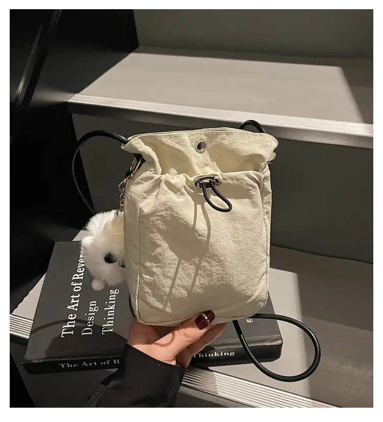 Lightweight Women's Drawstring Bag with Pom Pom Charm — feature 4