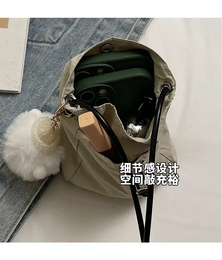 Lightweight Women's Drawstring Bag with Pom Pom Charm — feature 9