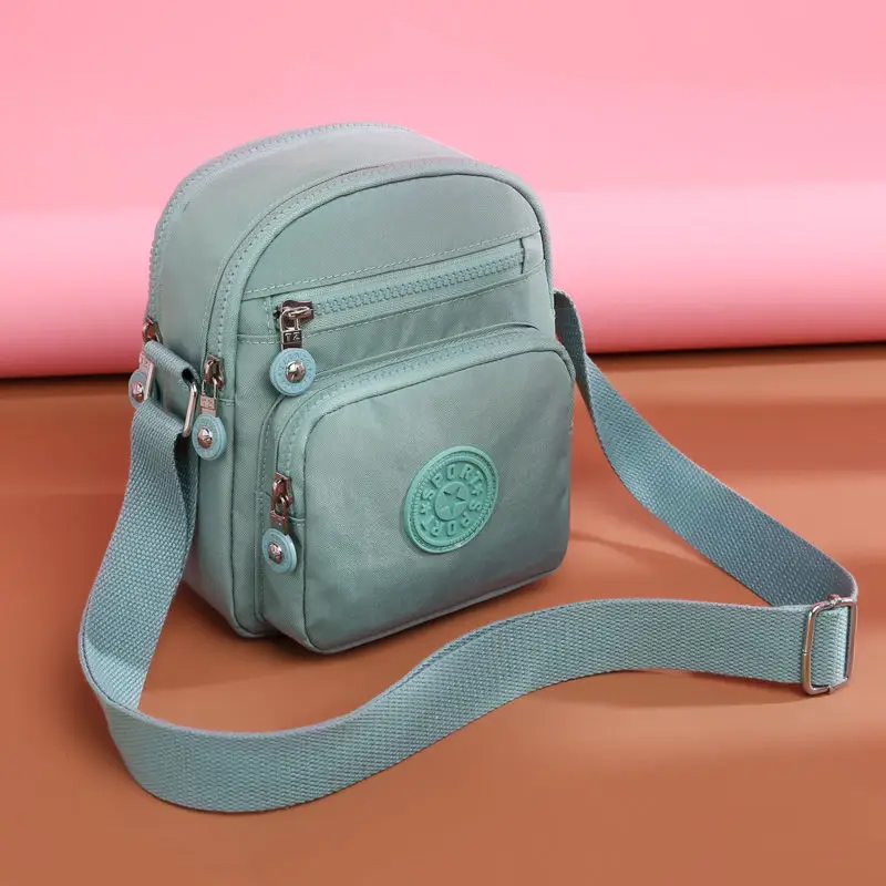 Women's Light Blue Crossbody Bag with Adjustable Strap - Image 15