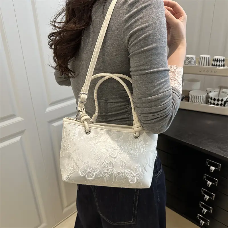 Pink Embroidered Textured Handbag for Women