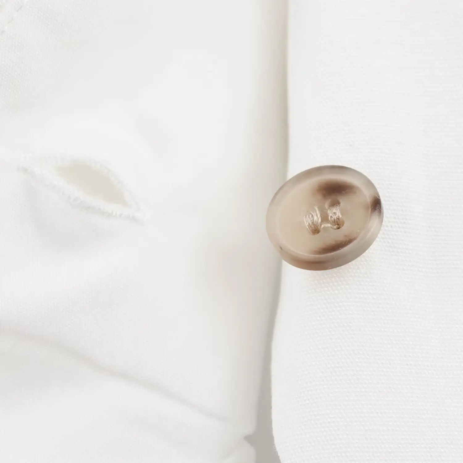 White Sleeveless Vest with Belted Pleated Pants — feature 10