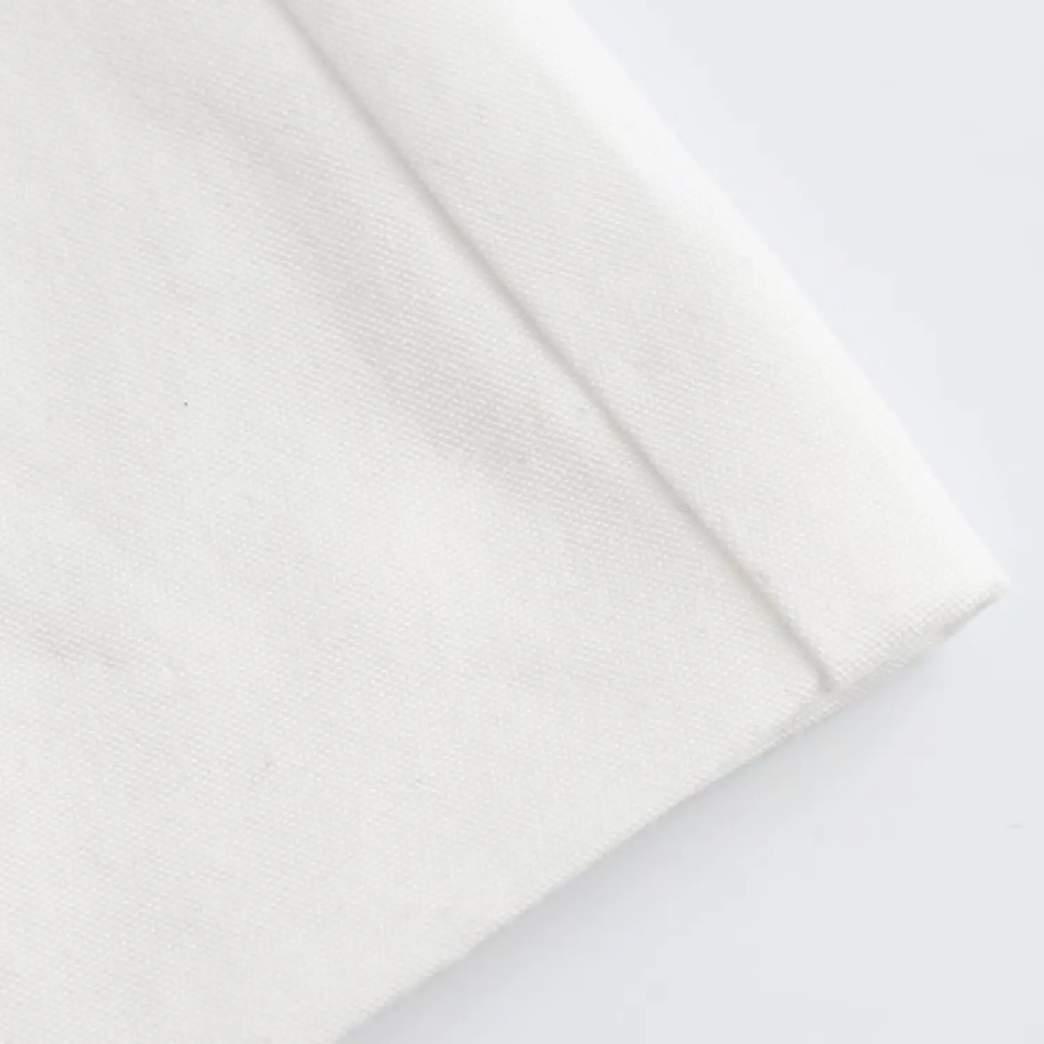 White Sleeveless Vest with Belted Pleated Pants — feature 17