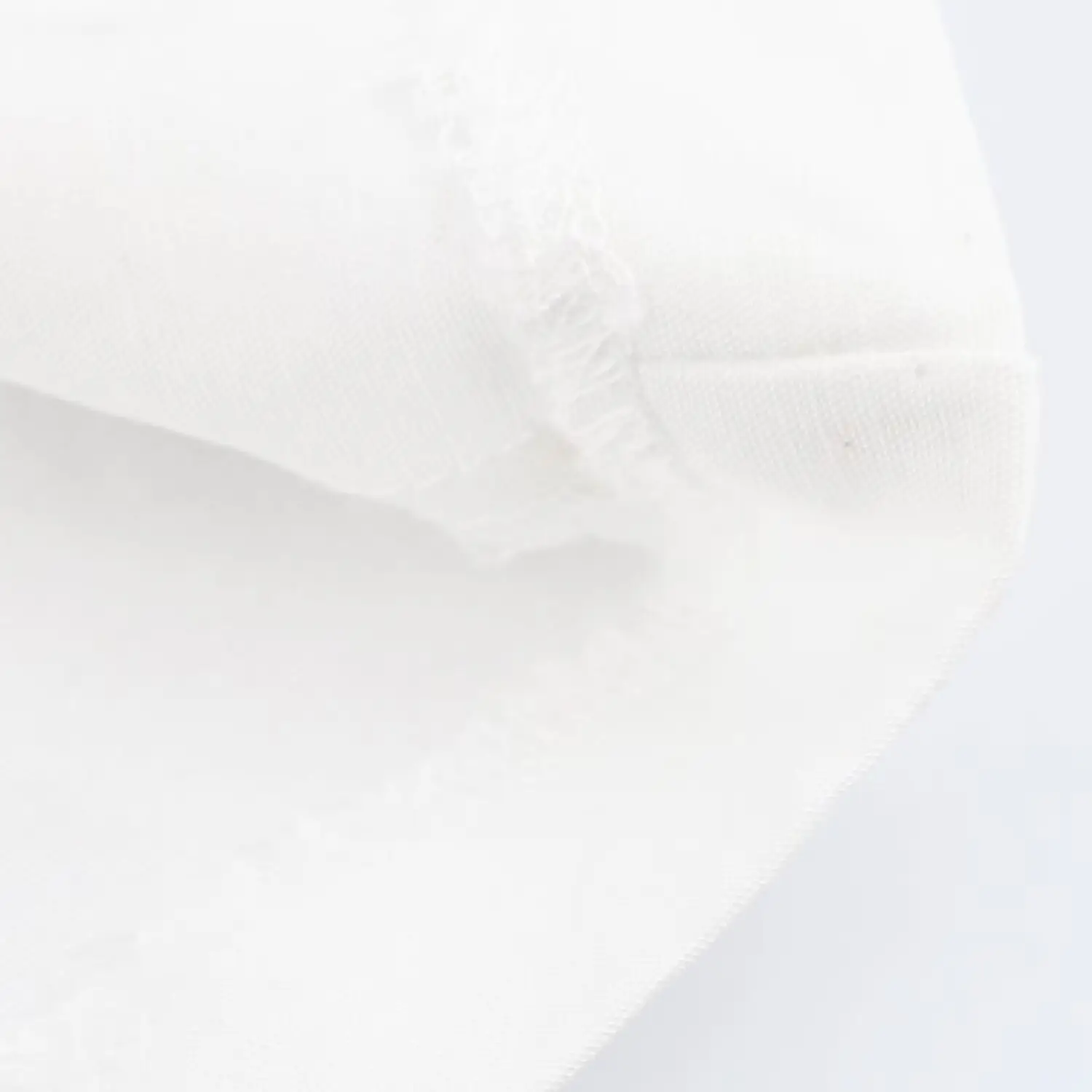 White Sleeveless Vest with Belted Pleated Pants — feature 18