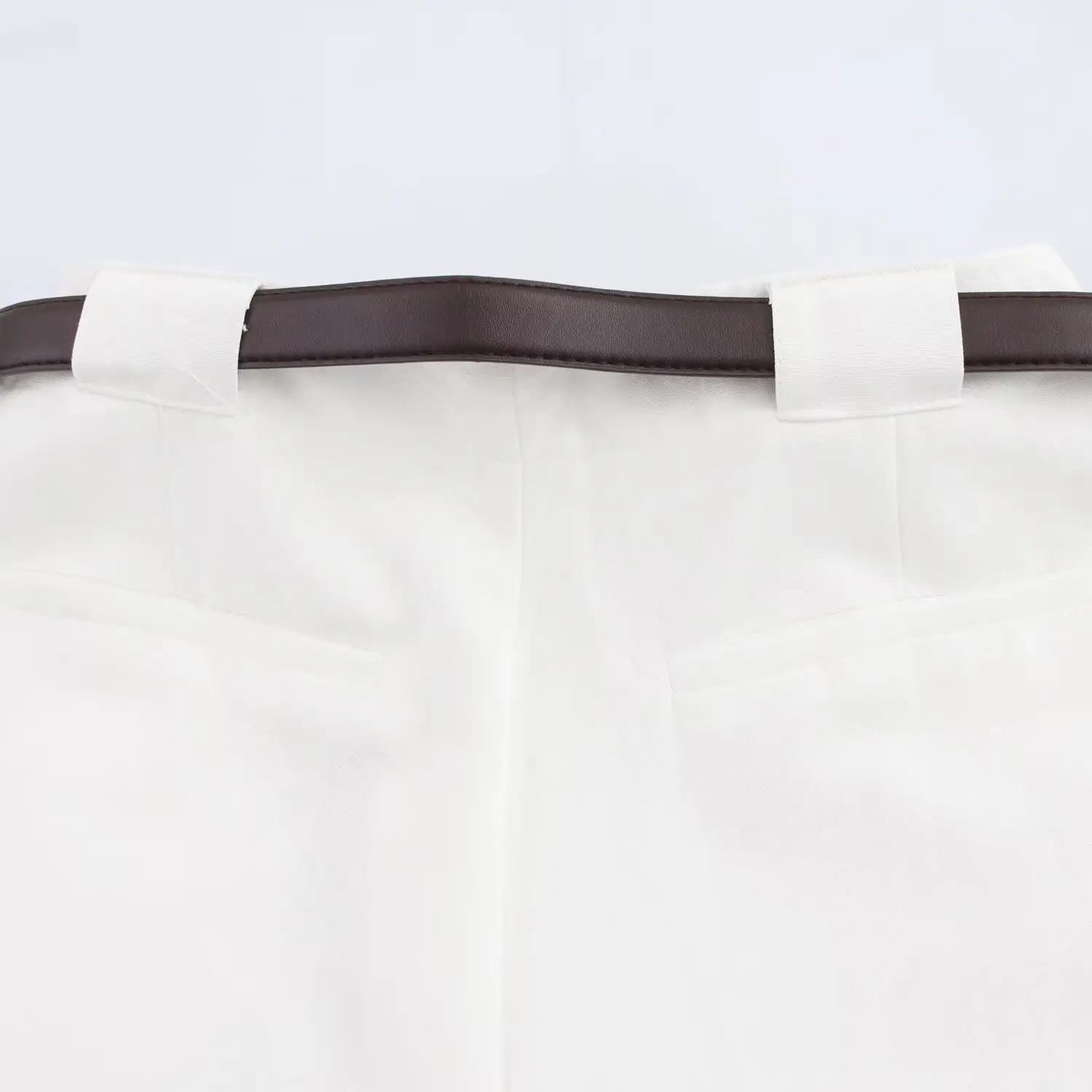 White Sleeveless Vest with Belted Pleated Pants — feature 19