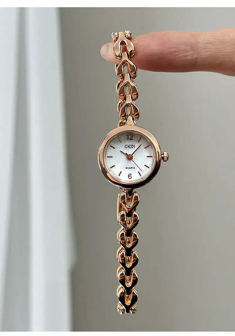 Gold Quartz Watch for Women with Chain Strap — feature 14