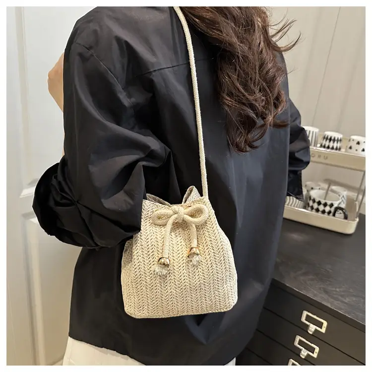 Women's Drawstring Bucket Bag Cream Woven 2025 — feature 10