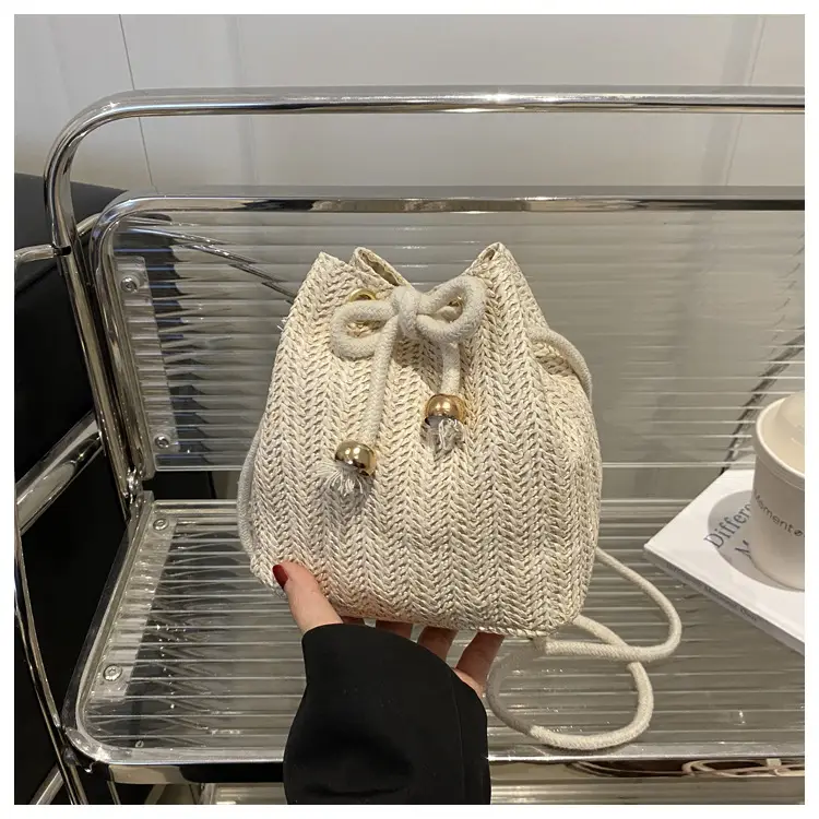Women's Drawstring Bucket Bag Cream Woven 2025 — feature 20