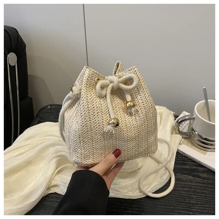 Women's Drawstring Bucket Bag Cream Woven 2025 — feature 22