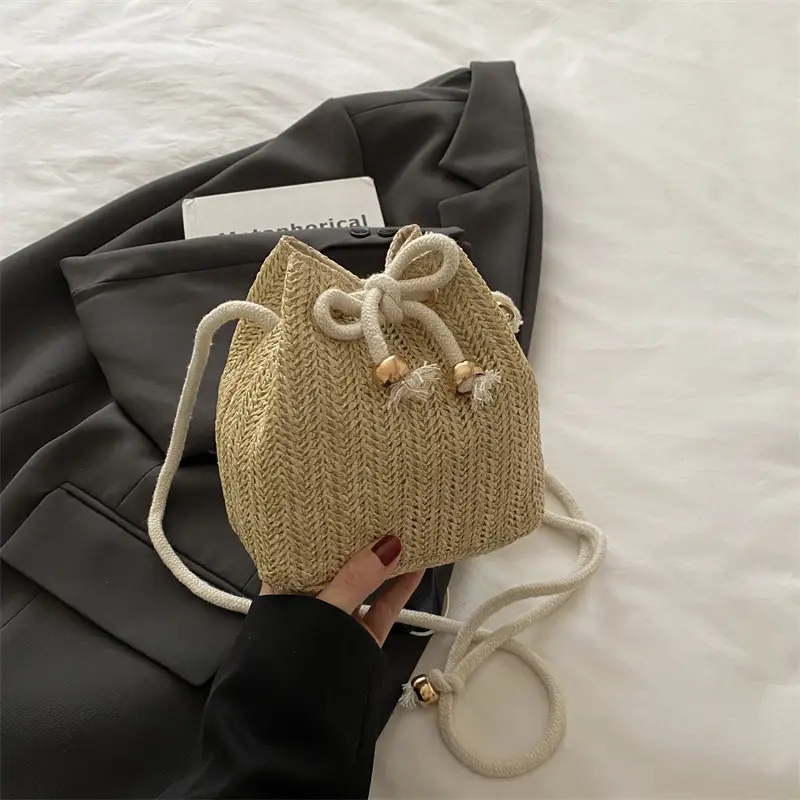 Women's Drawstring Bucket Bag Cream Woven 2025 - Image 2