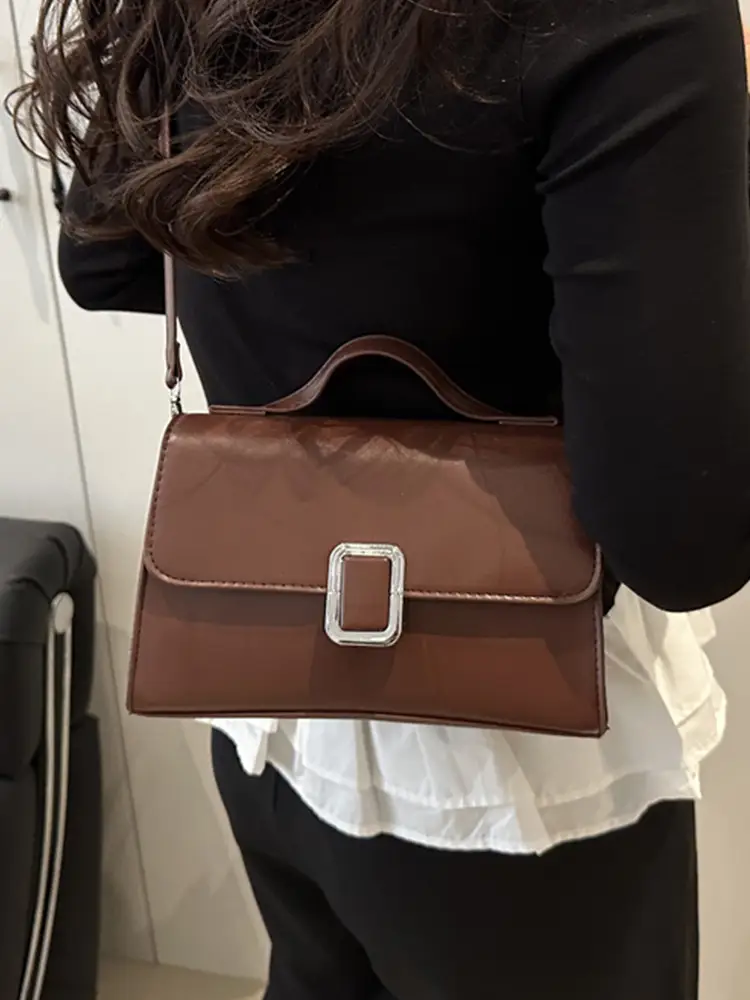 Black Minimalist Shoulder Bag with Silver Clasp - Image 10