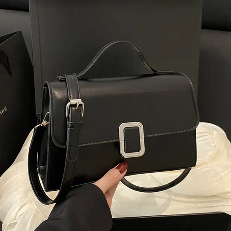 Black Minimalist Shoulder Bag with Silver Clasp - Image 3