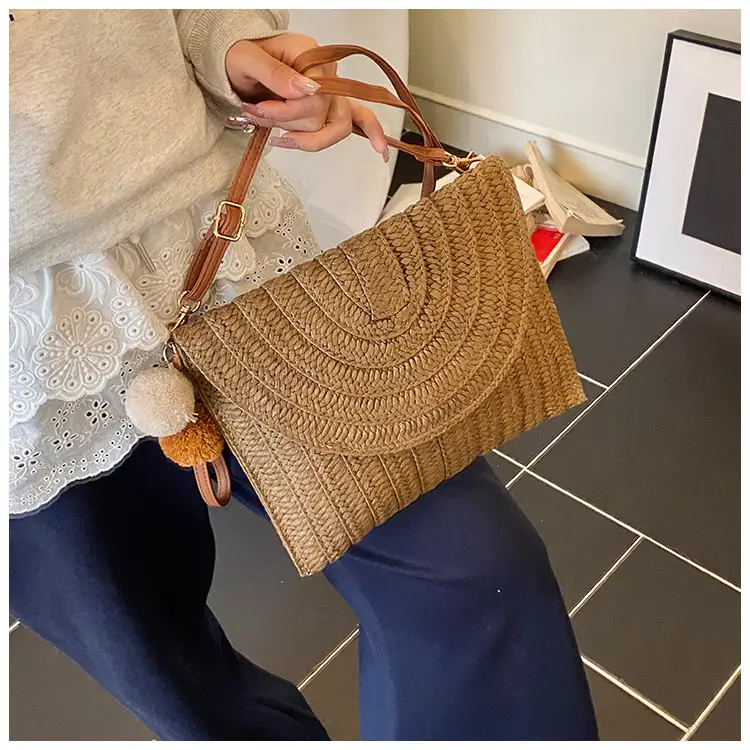 Women Straw Crossbody Bag with Pom Pom — feature 15