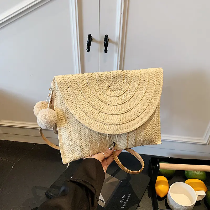 Women Straw Crossbody Bag with Pom Pom - Image 2