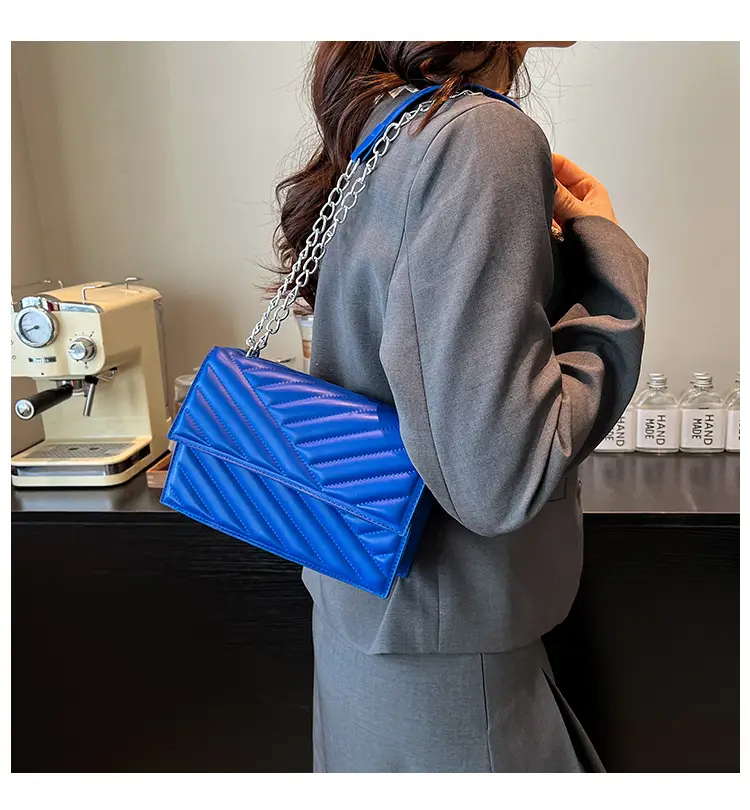 Blue Textured Microphone Bag for Women — feature 1
