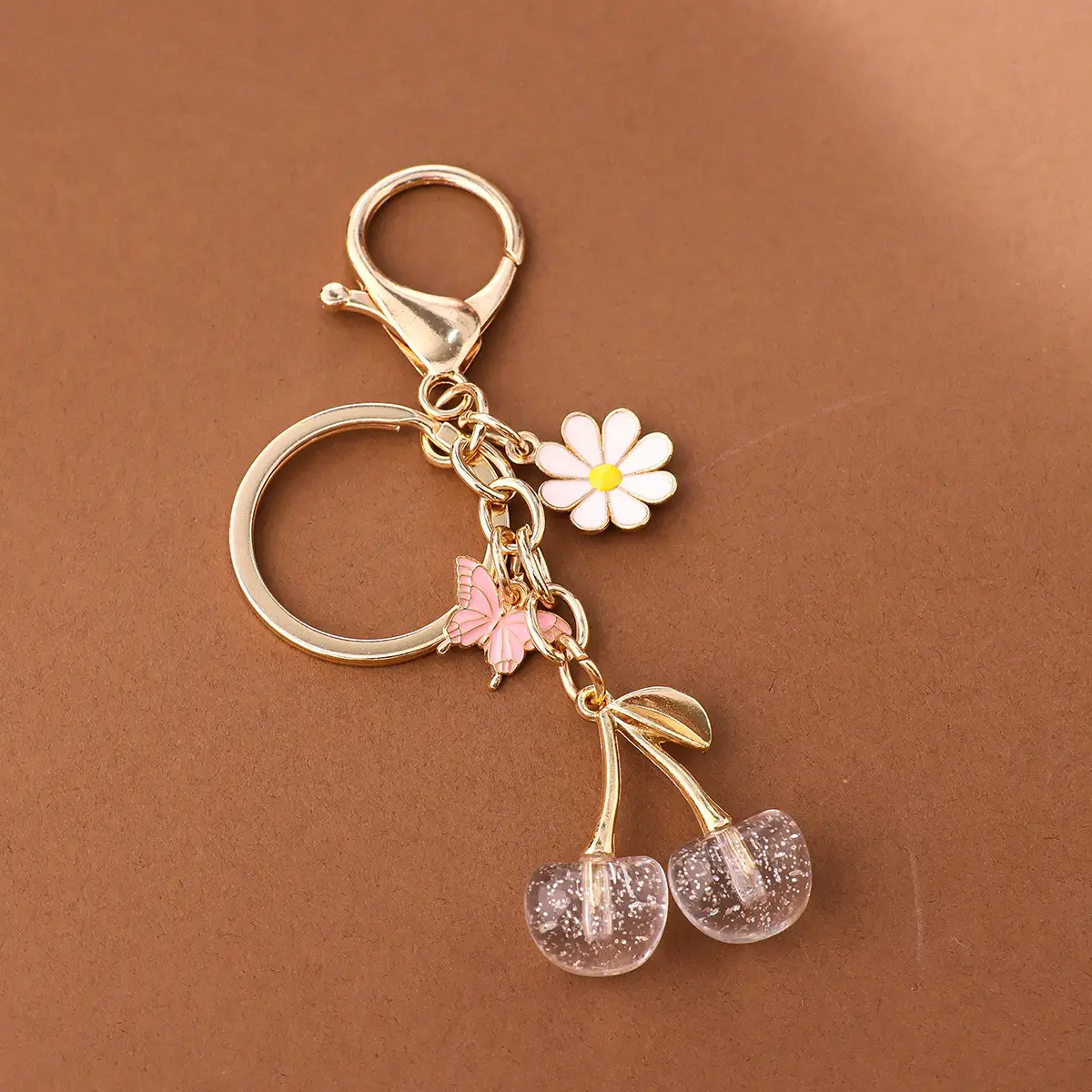Gold Flower Pendant with Cherry & Butterfly Design - Image 15