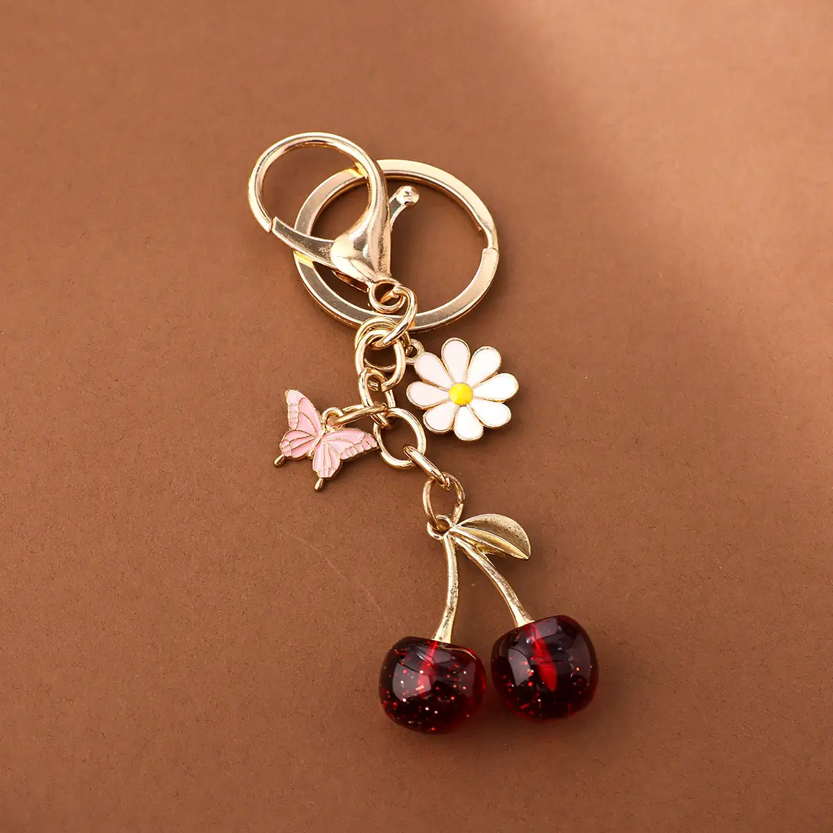 Gold Flower Pendant with Cherry & Butterfly Design - Image 5