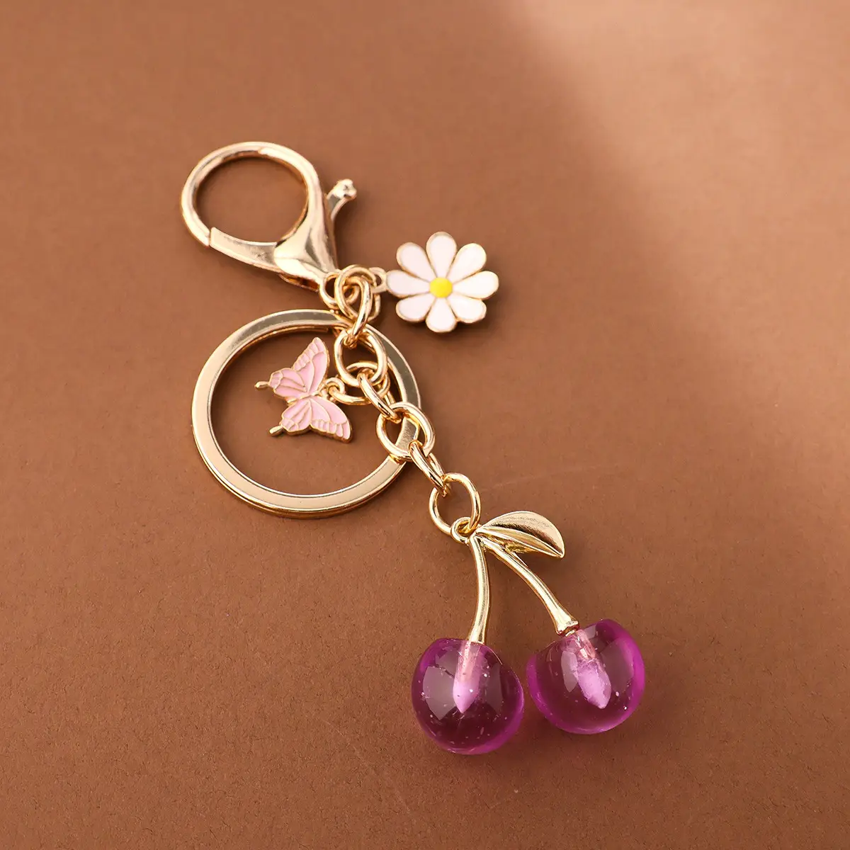Gold Flower Pendant with Cherry & Butterfly Design - Image 6