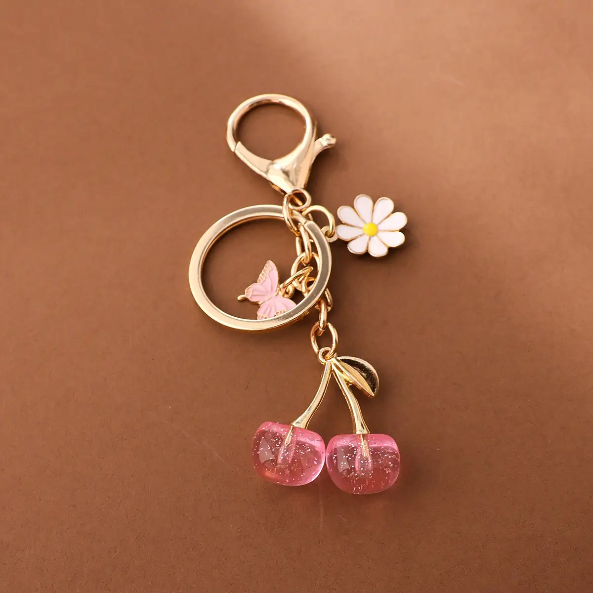 Gold Flower Pendant with Cherry & Butterfly Design - Image 9